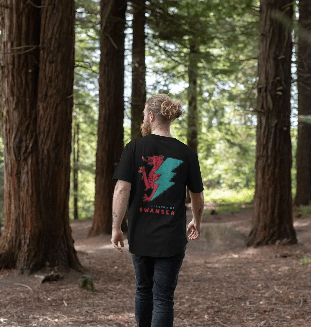 Man form Flashpoints' team walking in a forest.